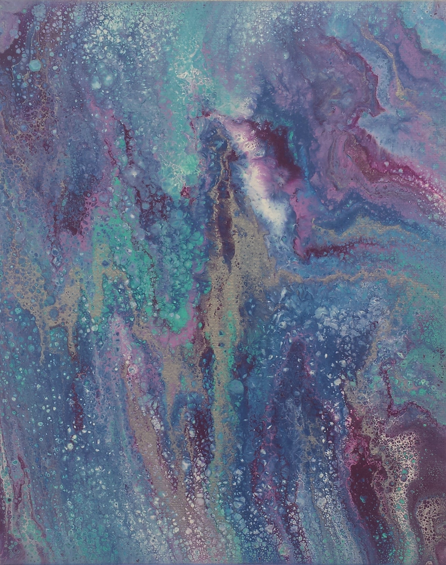 Abstract artwork with swirling colors in blue, purple, and green.