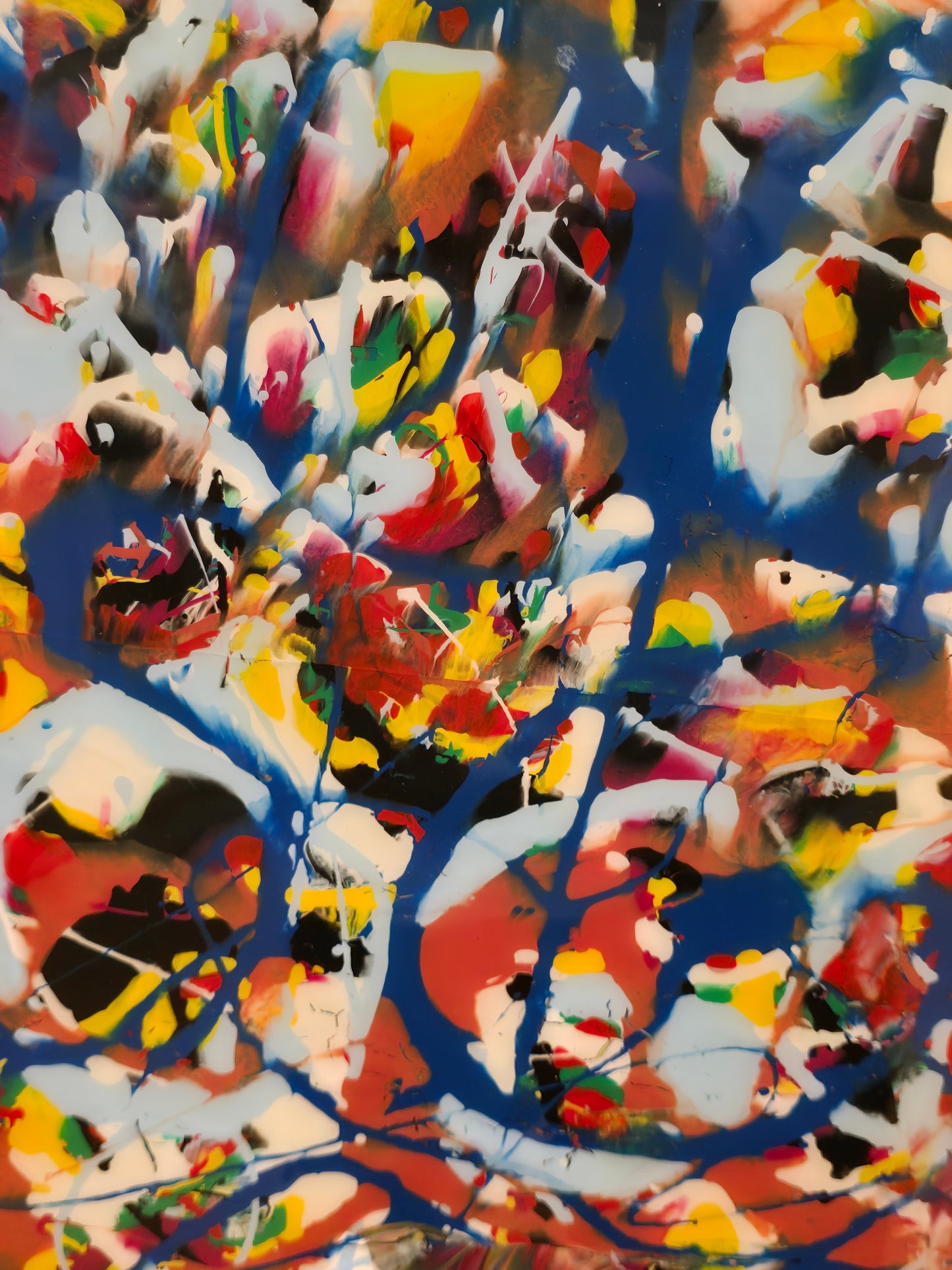 Colorful abstract painting with various shapes and patterns